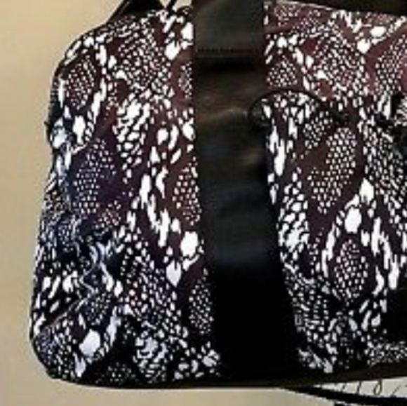 BEBE Sport Becca Large Duffel
Black/White Snake Pr - Picture 2 of 8
